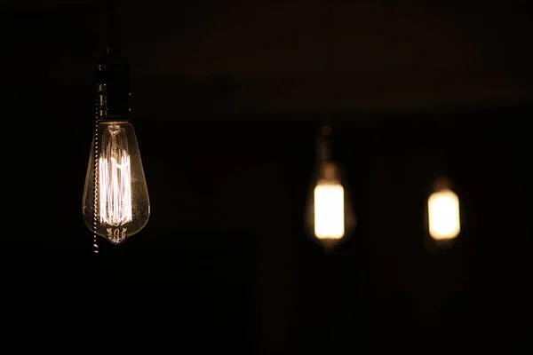 Lamps with tungsten filament. Edison\'s light bulb. Filament fila