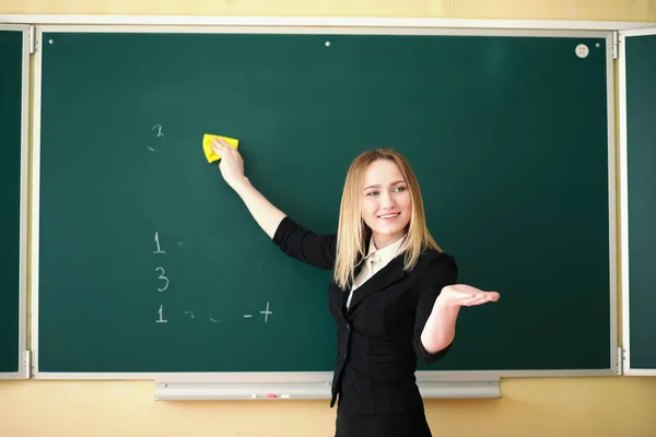 Young teacher in school class — Stock Photo, Image