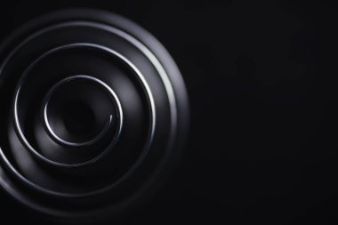 Metal spiral. Sonsuz dönüşler konsepti. Altın oran. Anılar ve yaşam yolu kavramı.