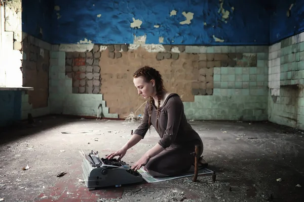 A young girl with old books in the old house