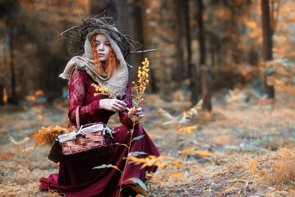 Fortune-teller conducts a ritual in the depths of the forest