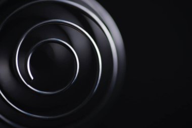 Metal spiral. Sonsuz dönüşler konsepti. Altın oran. Anılar ve yaşam yolu kavramı.