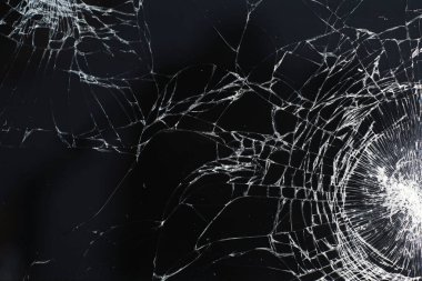 Camı kır. Kırık ekran. Bozuk telefon. Kırık cam arka plan. Camdaki beyaz çatlaklar.