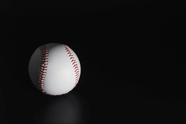 American traditional sports game. Baseball. Concept. Baseball ball and bats on a table.