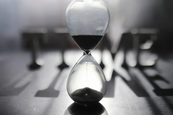 Concept Passage Time Hourglass Dark Background Inscription Time Shadow Surface — Stock Photo, Image