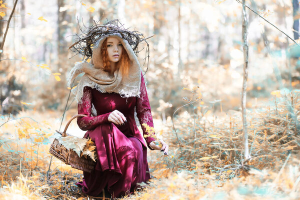 Fortune-teller conducts a ritual in the depths of the forest