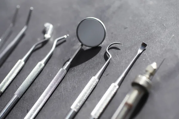 Equipment for the dental office. Orthopedic Instruments. Dental technician with work tools. Dentist metal tools.