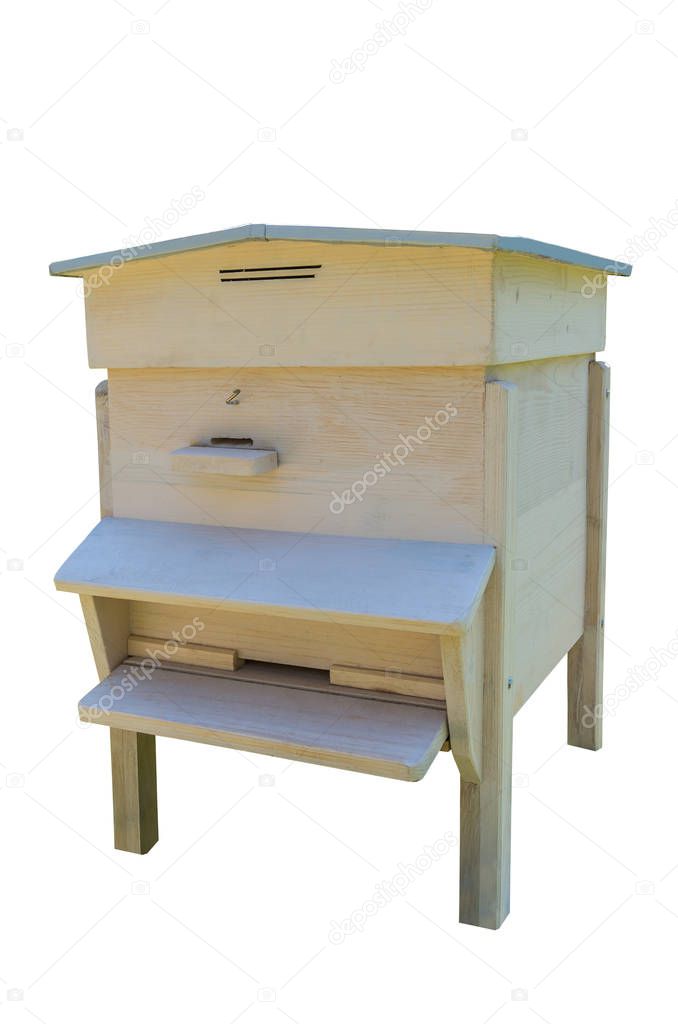 Wooden beehive for bees on honeycombs. On a white background.