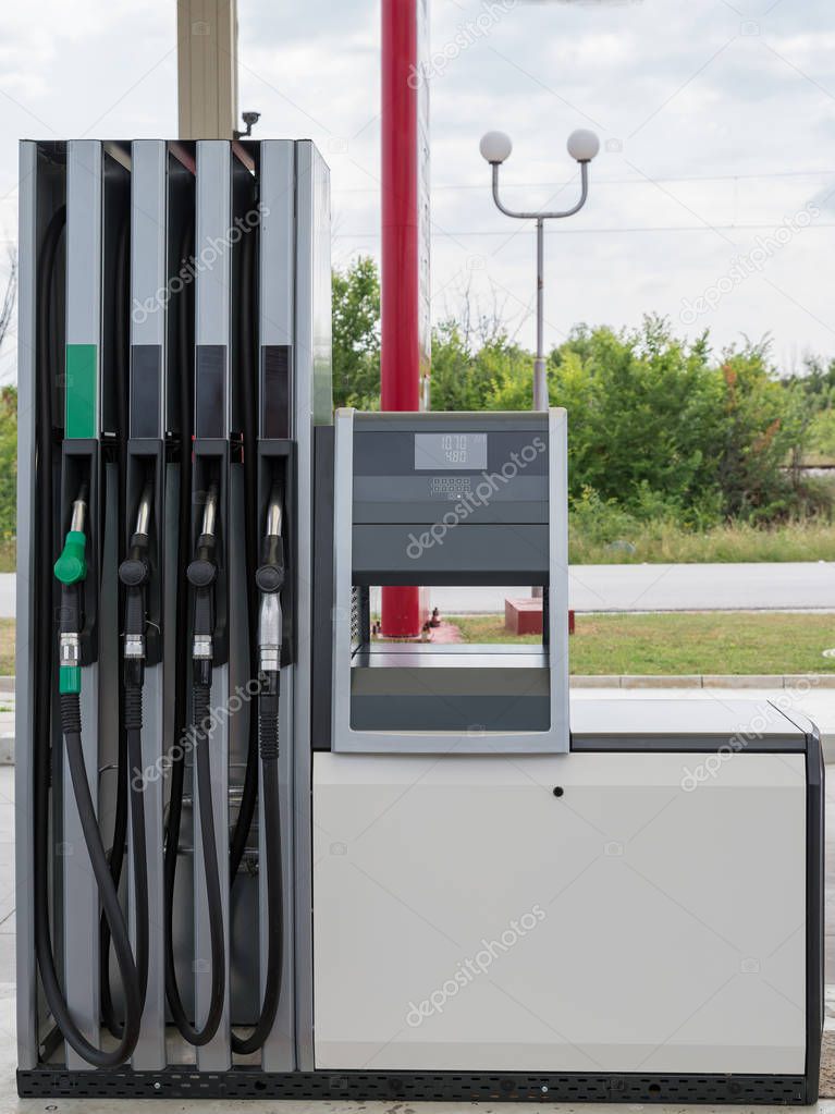 Fuel oil gasoline dispenser. Gas station.
