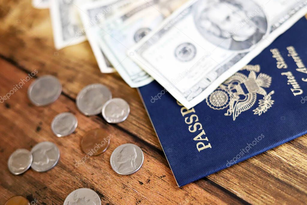 American passport and US dollars and coins, Travel image
