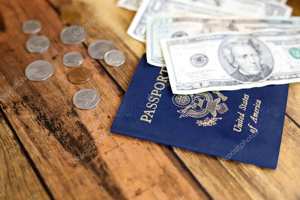 American passport and US dollars and coins, Travel image