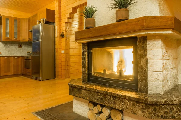 Fireplace with burning fire. Warm home interior