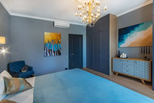 Modern bedroom with wardrobe. Contemporary interior design