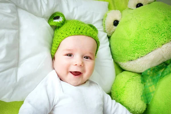 Baby on green blanket — Stock Photo, Image