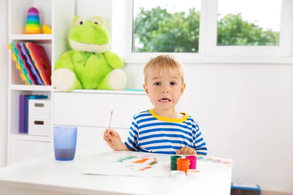 Little Child Drawing Paper Boy Sitting Chair Table Paints — Stock Photo, Image