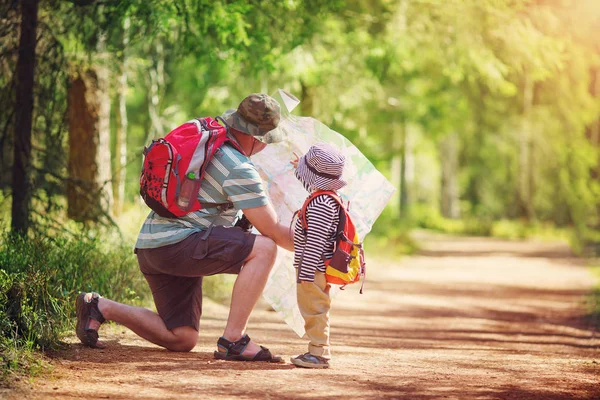 Father and boy going camping with tent in nature — Stock Photo, Image