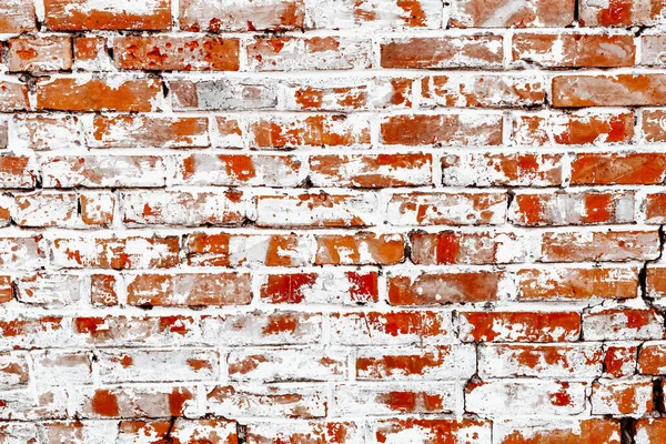 Rustic red brick background with white paint — Stock Photo, Image