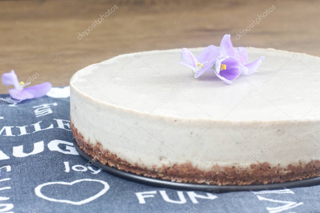 Photo of homemade vegan raw food cake made from coconut fat.
