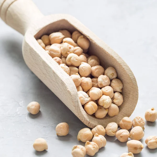 Uncooked Dry Chickpeas Wooden Scoop Closeup Square Format — Stock Photo, Image