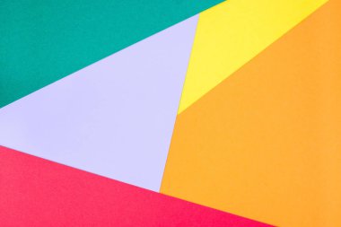 Yeşil, menekşe, turuncu, kırmızı ve sarı kağıttan yapılmış geometrik desen, bir şablon, yatay, kopyalama alanı için soyut boş arkaplan