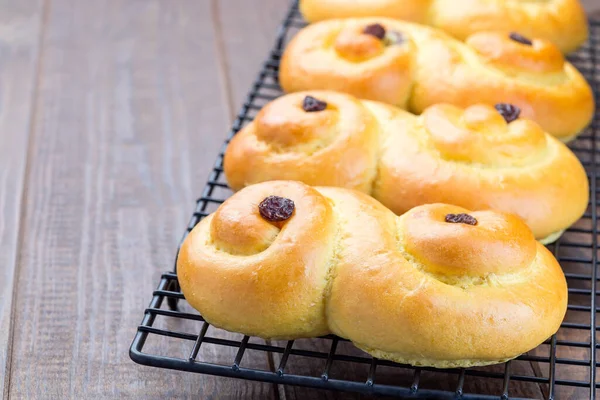 Swedish Scandinavian Christmas Saffron Buns Lussekatter Cooling Tray Brown Wooden — Stock Photo, Image