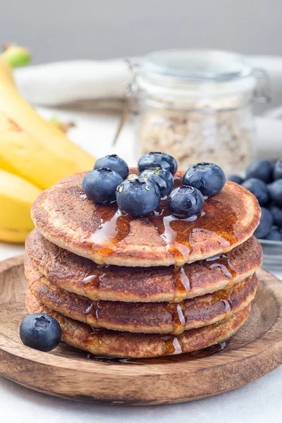 Healthy Oatmeal Banana Pancakes Garnished Blueberry Honey Wooden Plate Vertical — Stock Photo, Image