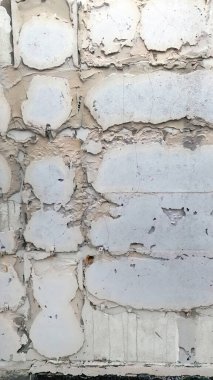 Yapım aşamasında kapatma, yıkma, var olan alçı duvarın soyulma dokusunu gösterme, soyut, sanat, arka plan veya duvar kağıdı veya dikey alan için arka plan,