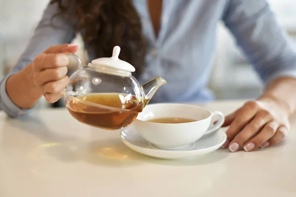 Woman drinking tea, tea time