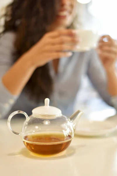 Woman drinking tea, tea time