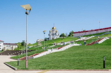 Samara, Russia. Volzhsky Avenue, in front of the Glory Square. St. George's Church. 05/22/2018 clipart