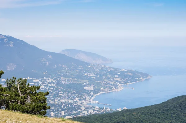 Resort city by the sea. Republic of Crimea, Yalta. 06.13.2018: View of Yalta and the Black Sea from Mount Ai-Petri