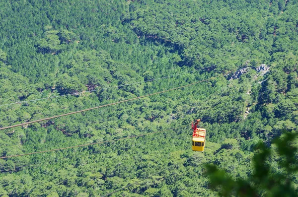 Cable car high above the forest. Republic of Crimea. 06.13.2018. Cable car Mishor - Ai-Petri