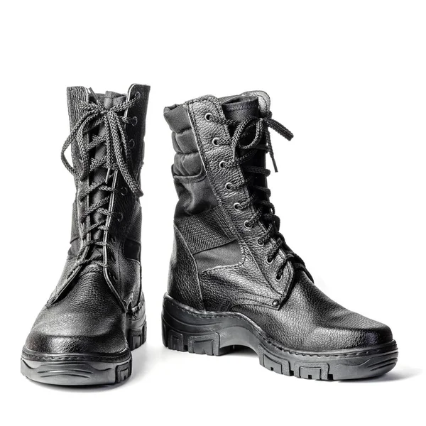 Black high boots. Army laced boots. Isolated on white background