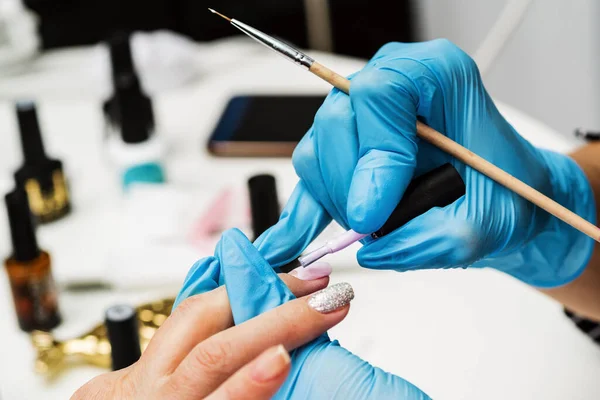 Nail Salon Masters Hand Closeup Shows Options Colored Nail Polish — 图库照片