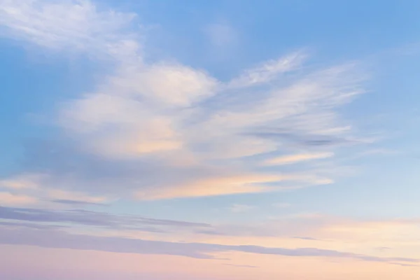 Beautiful summer sunset with clouds over the sea