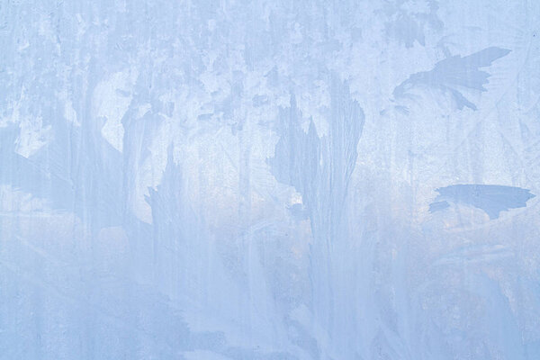 Frosty patterns on a frozen ice box in the early morning
