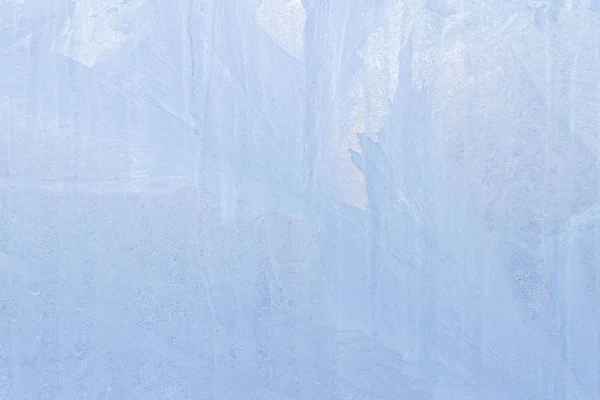 Frosty patterns on a frozen ice box in the early morning