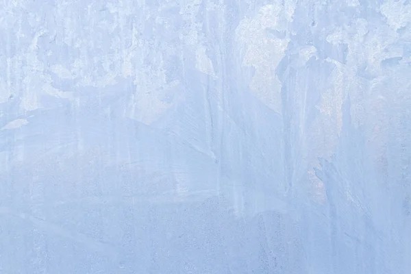 Frosty patterns on a frozen ice box in the early morning