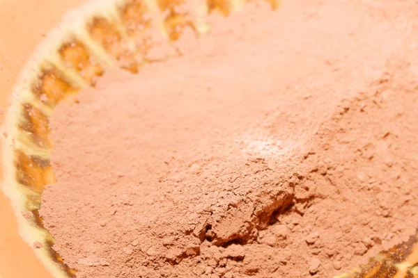 stock image Dry cocoa powder poured into a brown ceramic plate