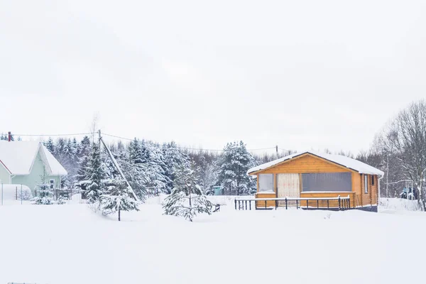 A typical suburban two-storey wooden house, the cottage near the — Stock Photo, Image