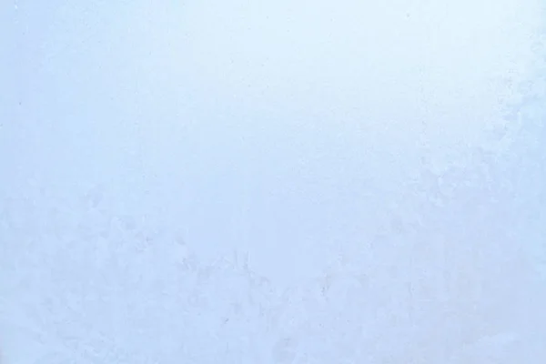 Padrões gelados em uma caixa de gelo congelada no início da manhã — Fotografia de Stock