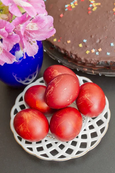 Dyed eggs in onion skins are at the plate