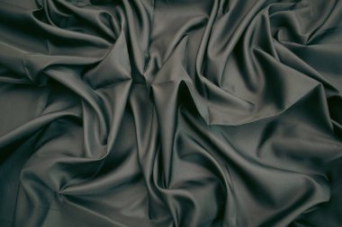 Malzemenin dokusu lüks, minimalizm ve zarafet atmosferi yaratıyor. Tasarım projeleri, moda konseptleri, reklam afişleri veya şık bir arka plan için mükemmel..