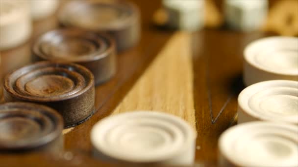 Winning layout of devils bones on the backgammon board — Stock Video