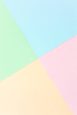 Arka plan pastel renkleri: pembe, sarı, mavi, yeşil. Geometrik şablon kağıtları. Minimum konsept. Düz yatış, Üst Görünüm. 