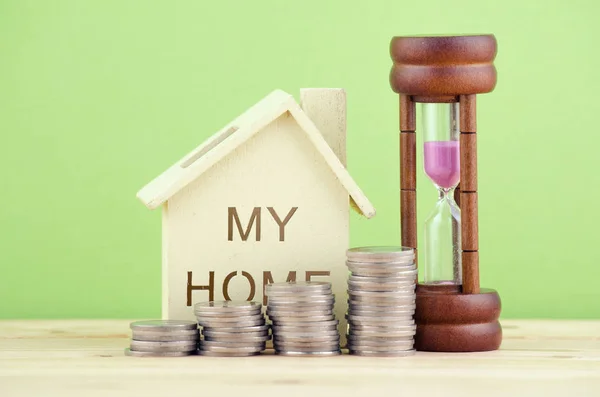 Time Money Concept Stacking Coins Wooden House Hour Glass Wooden — Stock Photo, Image