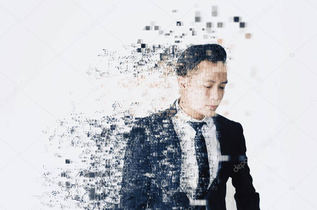 young businessman with dispersing and disintegrating into particles effect over white background