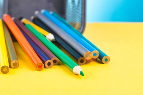 Colourful pencils over beautiful reverberation gradient background — Stock Photo, Image