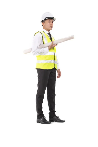 Young architect or engineer holding drawing paper on white background — ストック写真