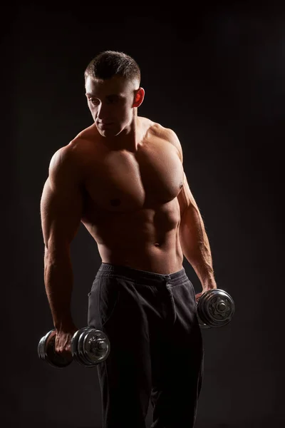 Shirtless Muscular Man Holding Dumbbells Black Background Studio Shot — Stock Photo, Image